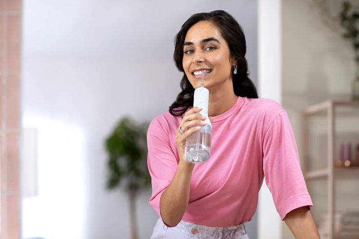 Іригатор Philips портативний Sonicare Cordless Power Flosser 3000, чаша 250 мл, чохол, 2 насадки , білий