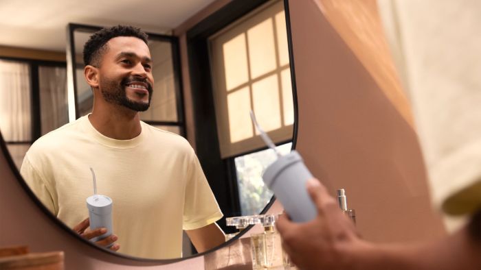 Ирригатор Philips Sonicare Compact Flosser 1000, чаша 200 мл, складной, голубой